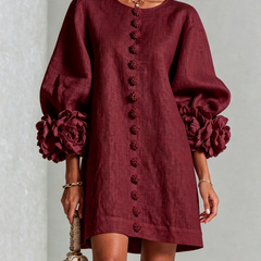 Burgundy button-down mini dress with vertical button placket and rose-like sleeve detailing