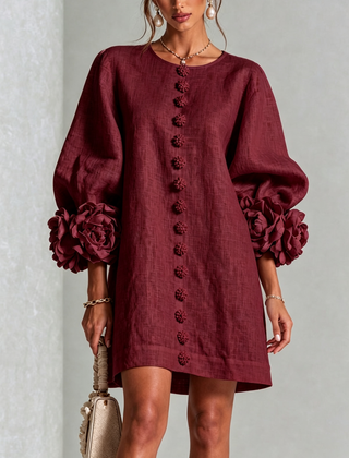 Burgundy button-down mini dress with vertical button placket and rose-like sleeve detailing