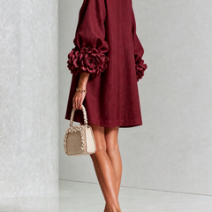 Burgundy button-down mini dress, back/side view, with vertical button placket