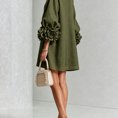 Olive button-down mini dress with rosette cuff sleeves and vertical gold button placket