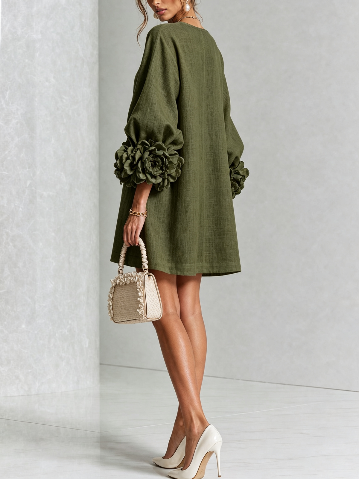 Olive button-down mini dress with rosette cuff sleeves and vertical gold button placket