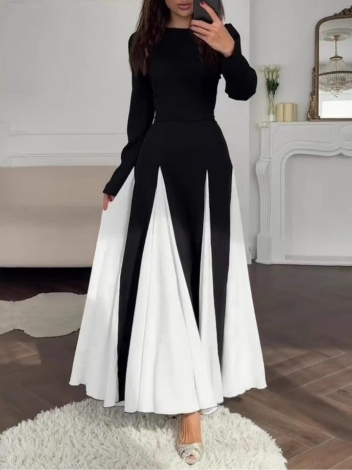 Celia™ black and white colorblock maxi dress, long sleeves, fitted waist, flared skirt
