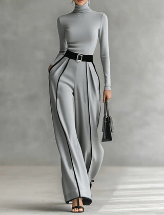 Grey high-neck long-sleeve top and wide-leg pants set with white trim and waist belt buckle.