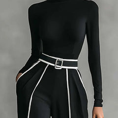 Black high-neck long-sleeve top with white-trim paneling and waist belt buckle.