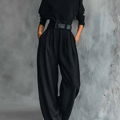 Black two-piece set: turtleneck long-sleeve top and belted wide-leg pants