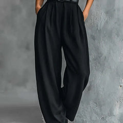 Black belted wide-leg pants with pleated front and adjustable waist buckle