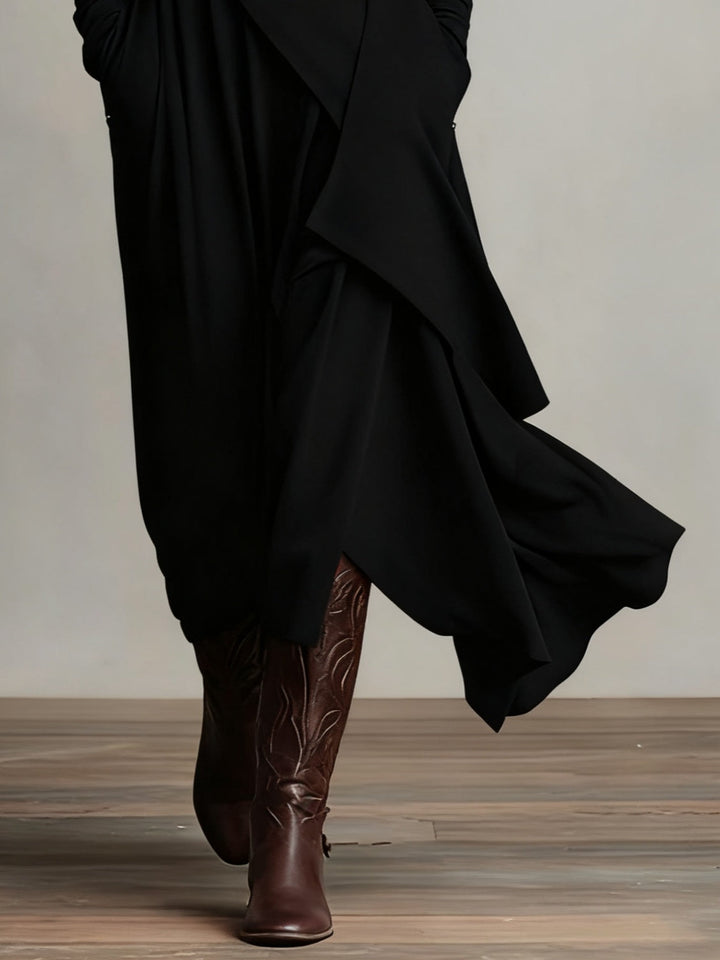 Katia™ Pleated Maxi Dress in black with layered pleats and flowing asymmetrical hem