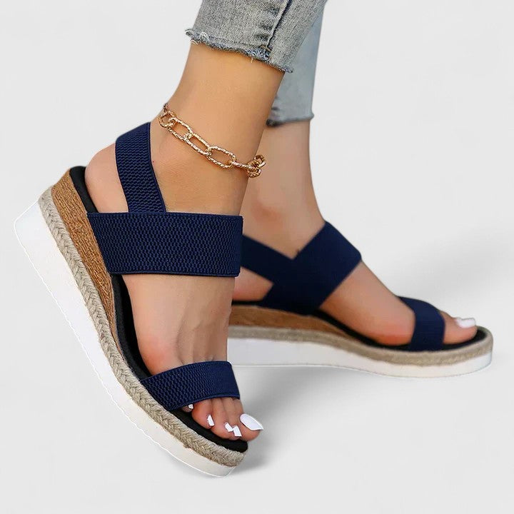 Dark blue orthopedic sandals with two wide hook-and-loop straps and platform sole