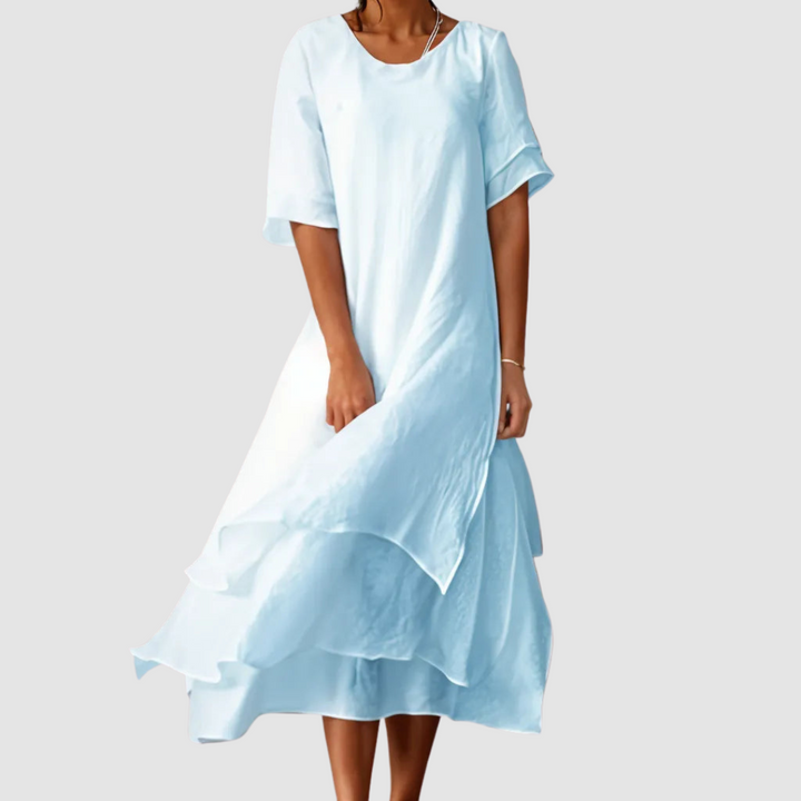 Light blue loose midi dress with short sleeves and layered ruffle hem