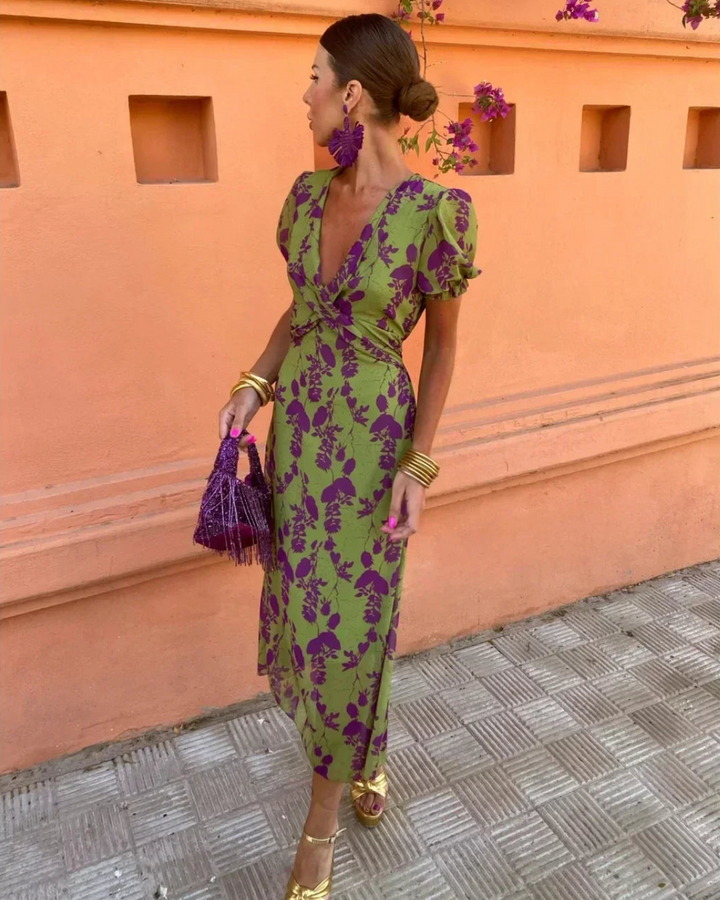 Green and purple floral wrap midi dress with deep V-neck, puff sleeves and gathered waist