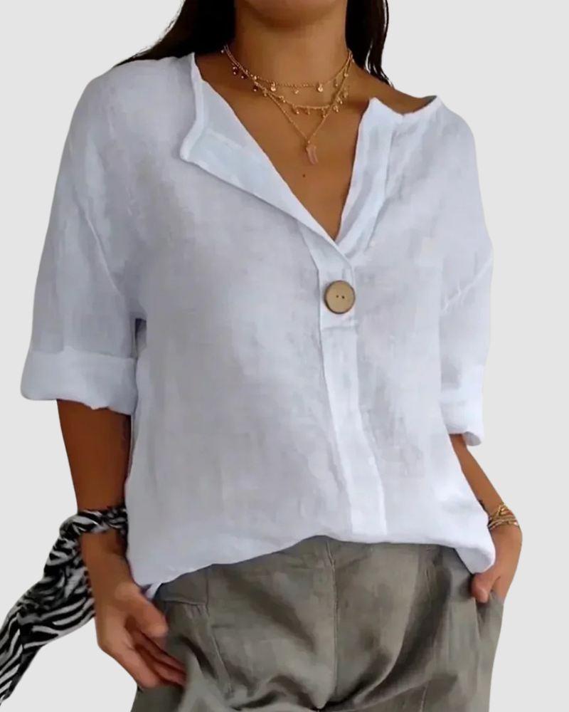 White V-neck button-front blouse with short roll sleeves and relaxed fit