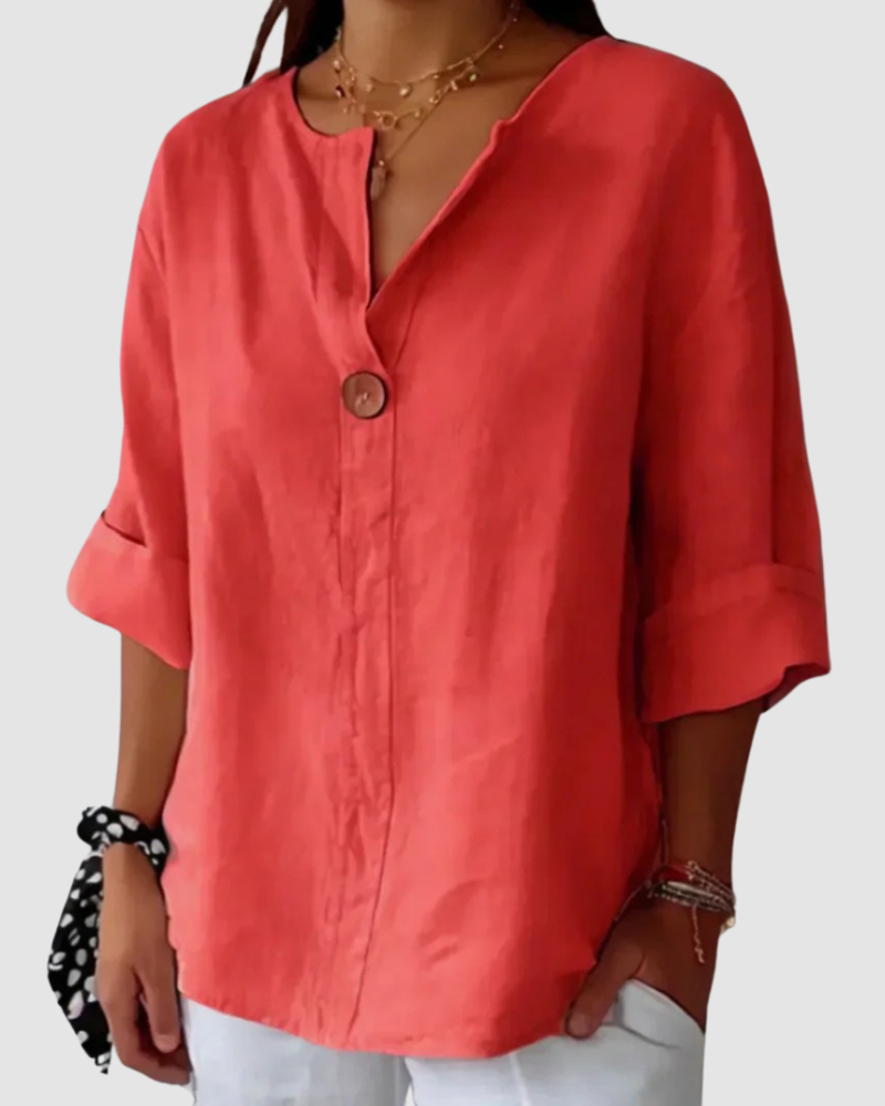 Red classic blouse with V-neck, button front, and short cuffed sleeves