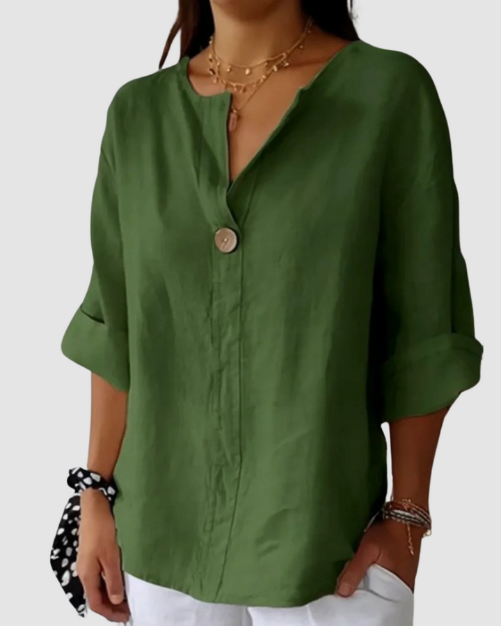 Green V-neck button-front blouse with short roll sleeves and relaxed drape