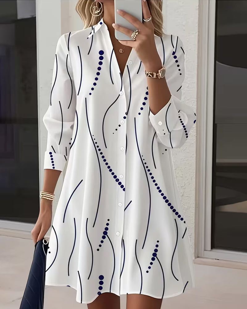 Women's white button-front wavy-collar shirt with navy lines and blue dot pattern