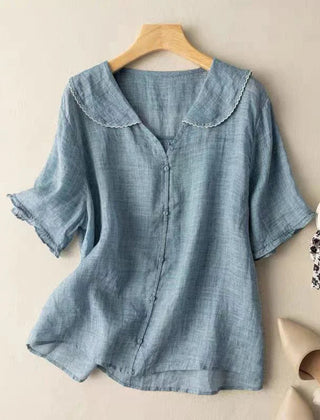 Blue cotton short sleeve blouse with scalloped peter pan collar and button front
