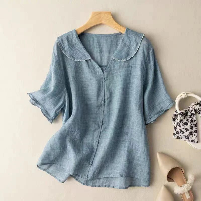 Blue cotton short-sleeve blouse with scalloped peter pan collar and button front