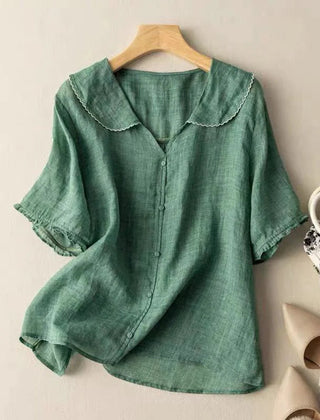 Green cotton short sleeve blouse with scalloped peter pan collar and button front