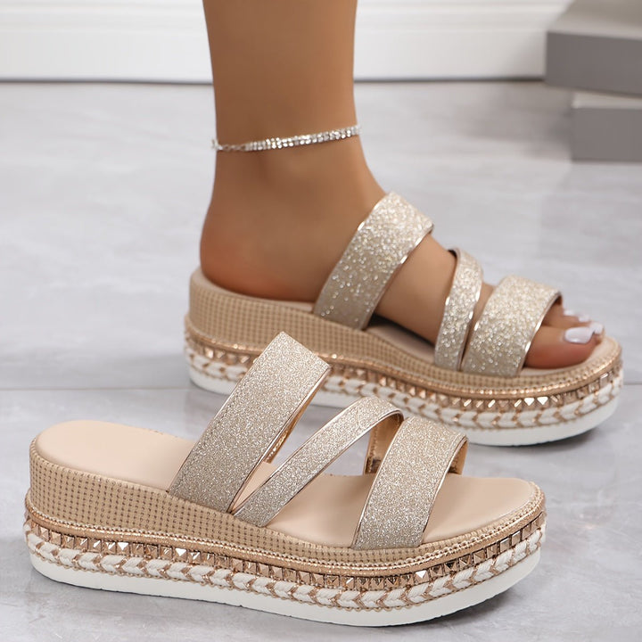 Gold glitter platform sandals with three wide straps and braided rope sole