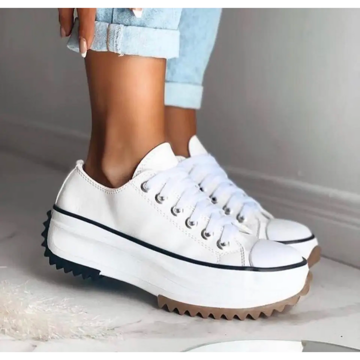 Dorothy™ women's lace-up sneakers in white with black side stripe and lug sole