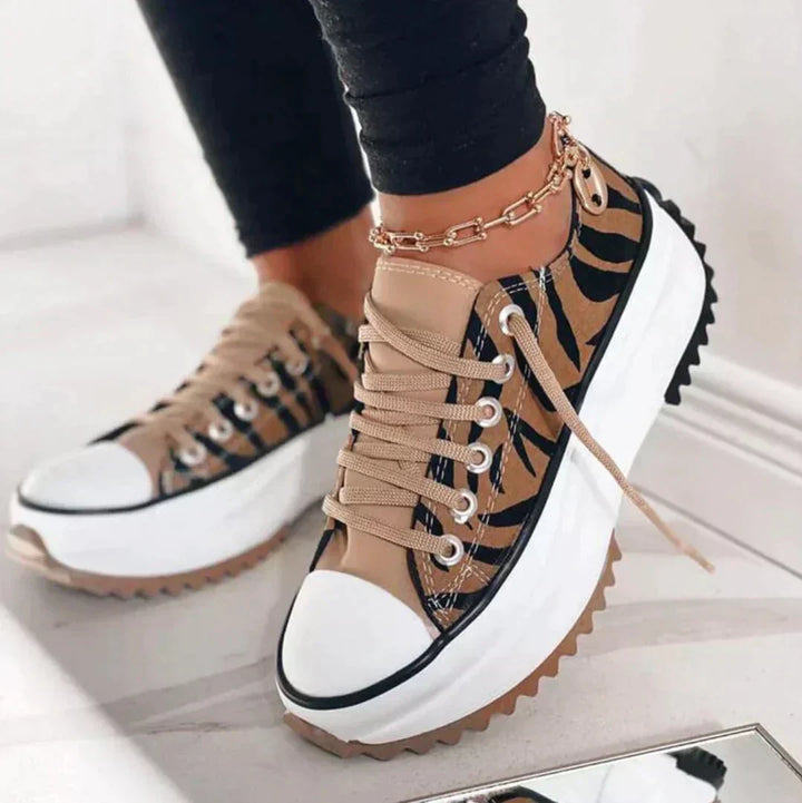 Dorothy™ women's lace-up tiger-print sneakers with white platform sole
