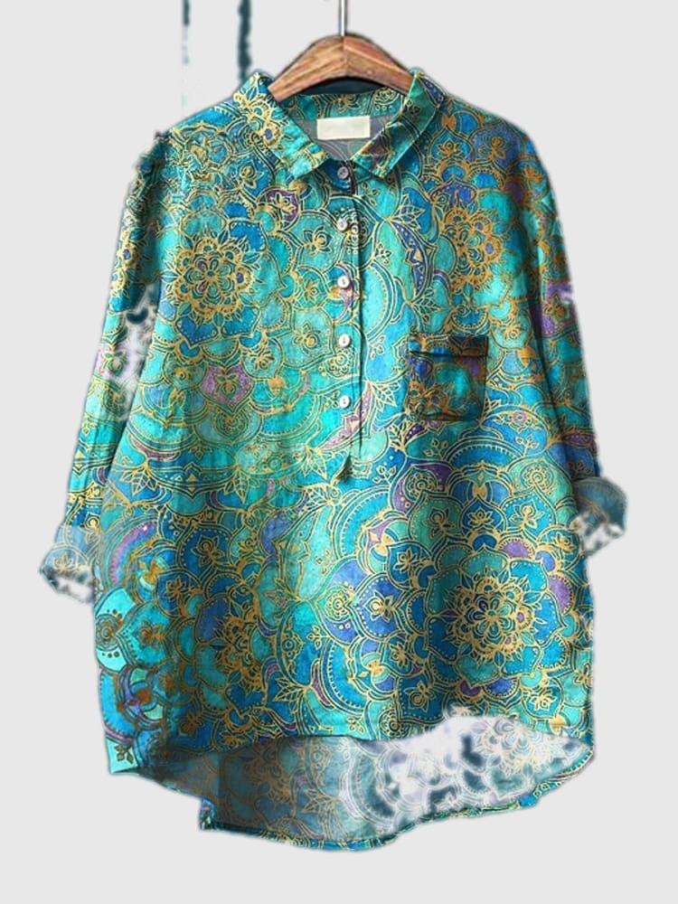 Mandala print shirt with button front, long sleeves, chest pocket; teal and green.