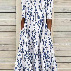 Blue and white floral midi dress with 3/4 sleeves, round neck, gathered skirt