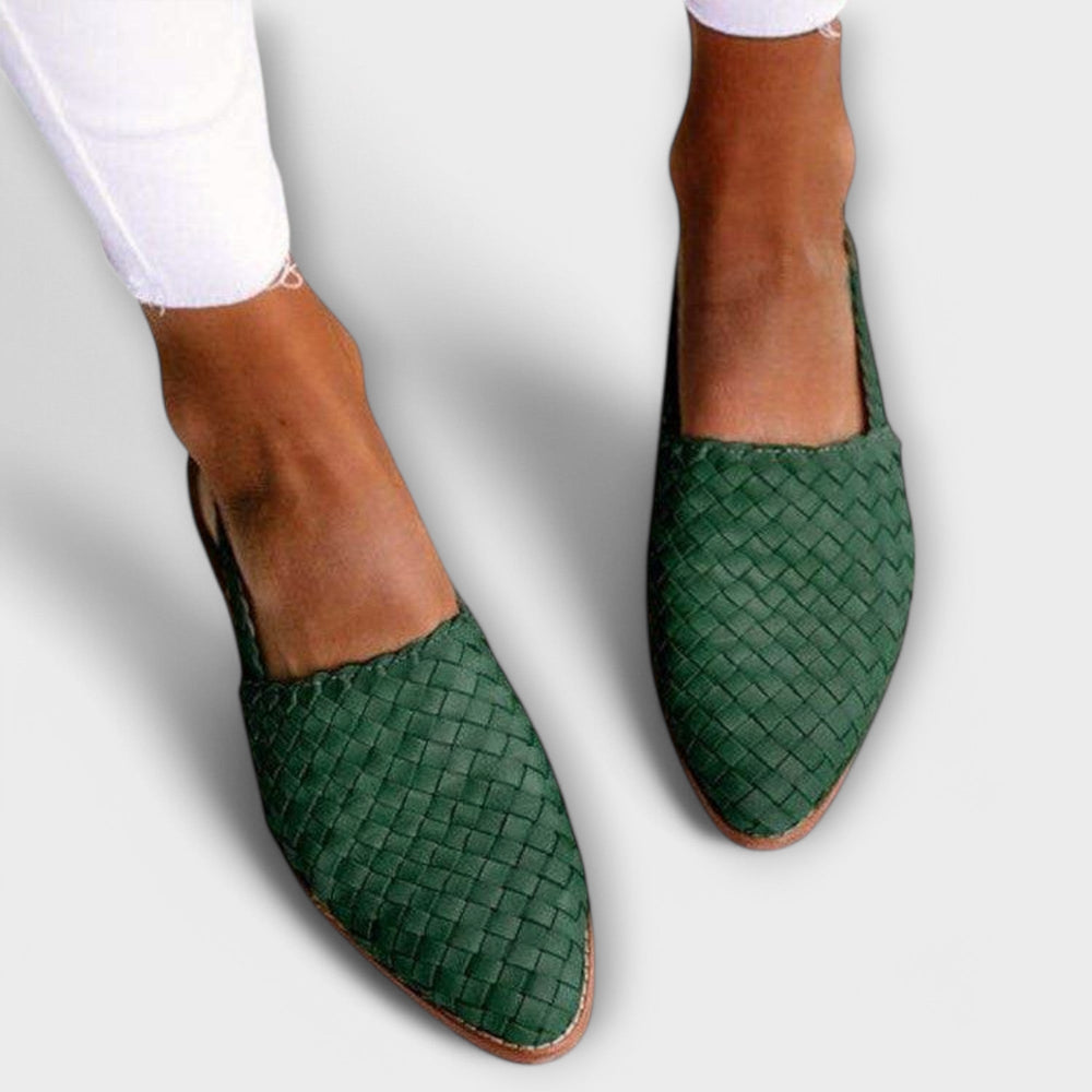 Green woven loafer with pointed toe and basket-weave upper