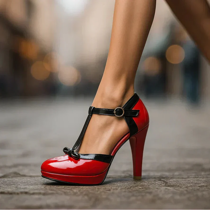 Estelle tie-strap heels in wine red patent with black strap and round buckle