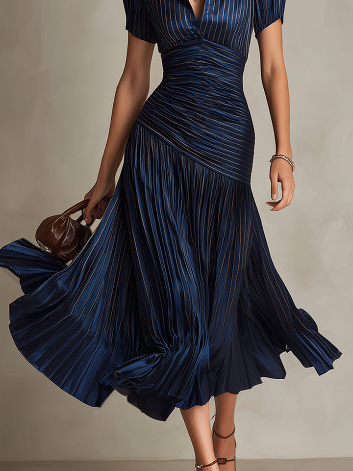 Navy blue ruched midi dress with short sleeves and gathered pleated skirt