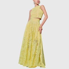 Yellow lace midi skirt with gathered tiers and cutout eyelet pattern