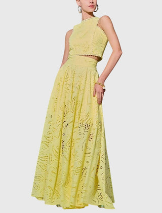 Yellow lace midi skirt with gathered tiers and cutout eyelet pattern