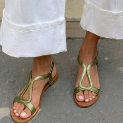 Green thong summer sandals with ankle strap and cutout straps over toes