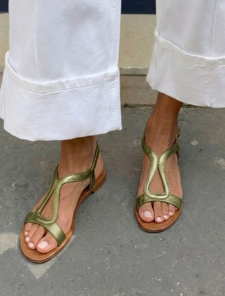 Green thong summer sandals with ankle strap and cutout straps over toes