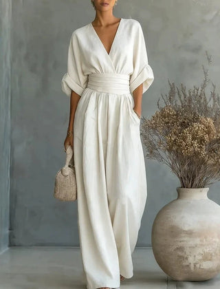 Women’s wide-leg jumpsuit in white with V-neck and elastic waist