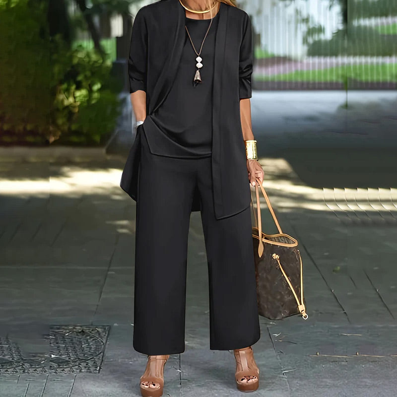 Black 3-piece lounge set with long tunic, front pockets, and wide-leg pants