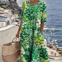 Green floral summer midi dress with short sleeves, round neckline, gathered waist