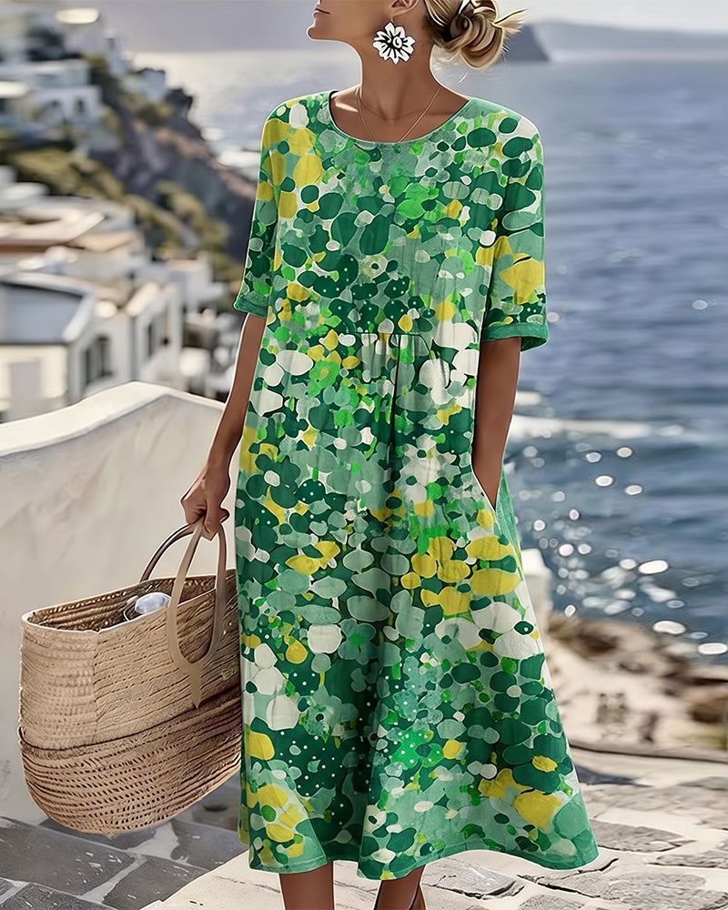 Green floral summer midi dress with short sleeves, round neckline, gathered waist