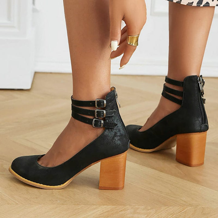 Kallie black ankle heels with two buckled straps and medium block heel