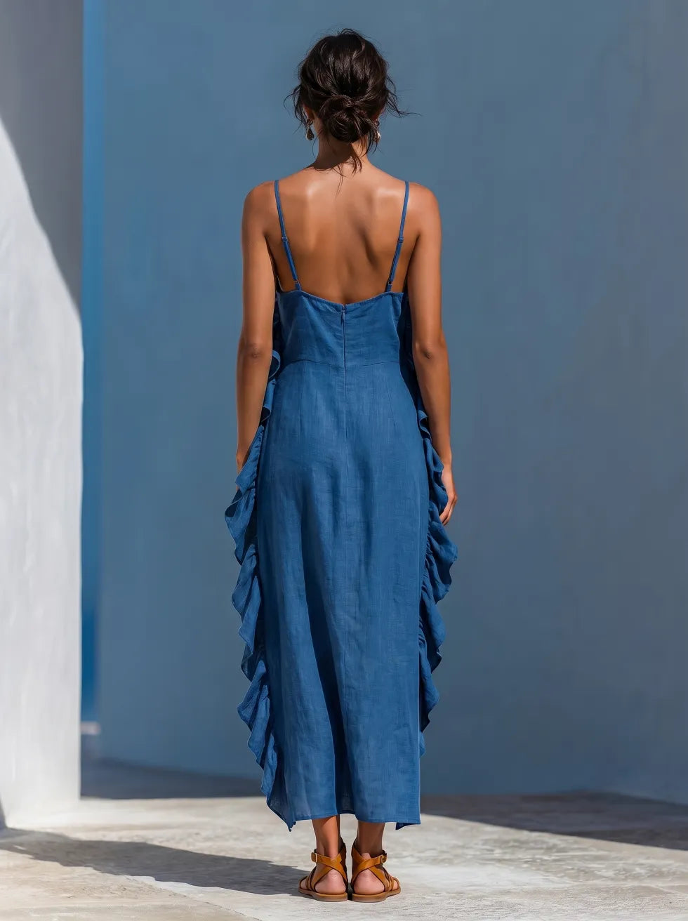 Blue maxi dress back view with spaghetti straps and cascading ruffle skirt