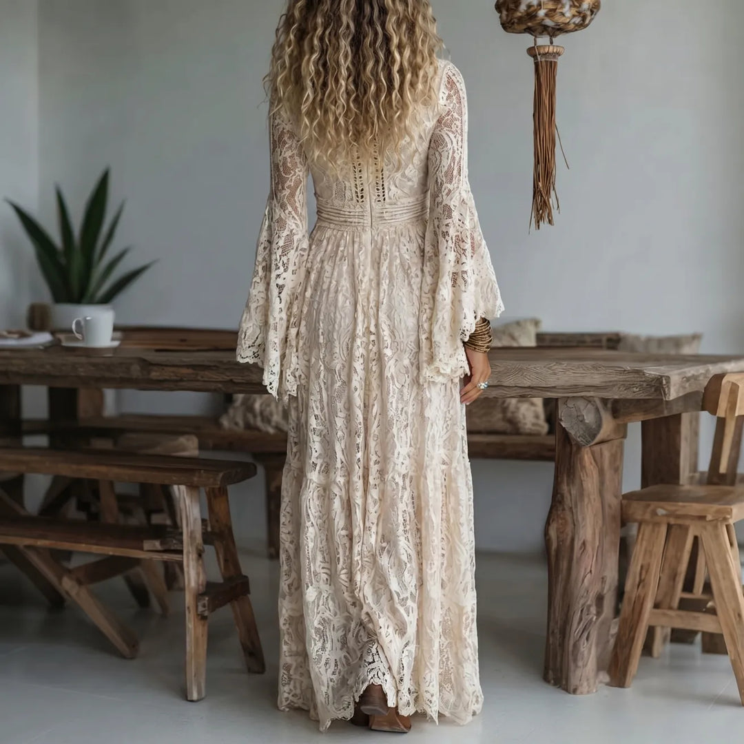 Ivory lace maxi dress with V-neck and long bell sleeves, back view