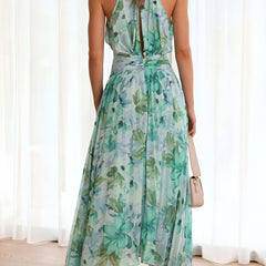Floral halter midi dress with open back and tied waist, aqua and teal print