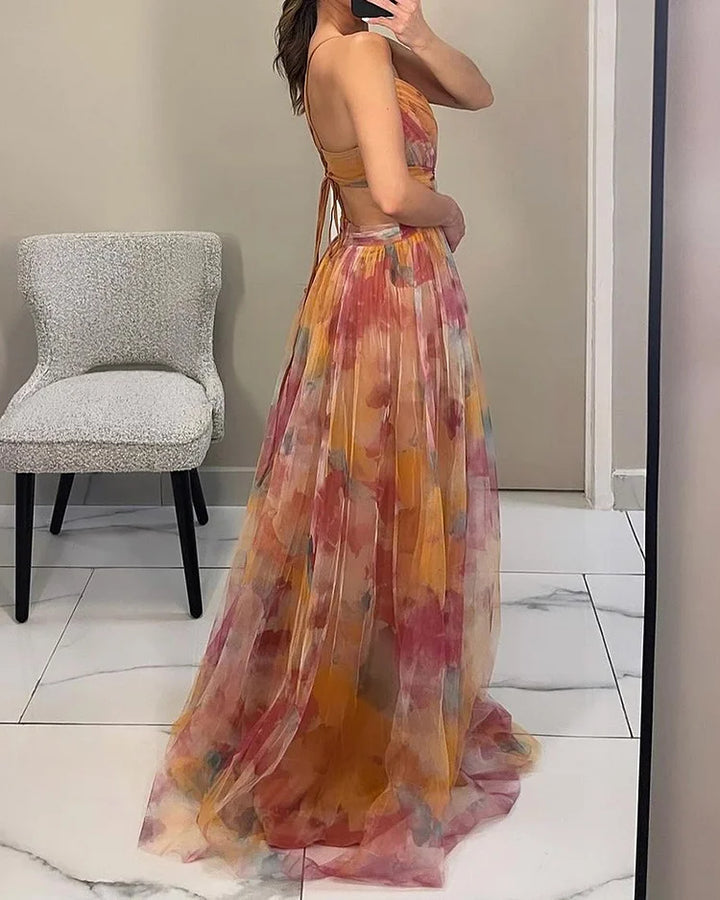 Orange, pink, and yellow halter maxi dress with gathered tiered skirt