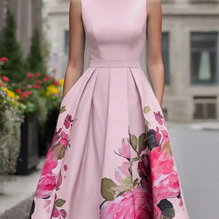 Blush pink sleeveless midi dress with fitted bodice and full skirt, large pink floral print