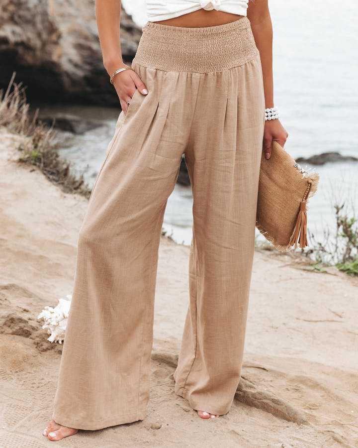 Loose summer pants in light brown with elastic smocked waistband and wide legs