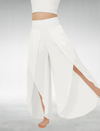 White wide-leg pants with elastic waist and flowing draped side slit legs