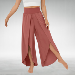Wine red wide-leg pants with elastic waist and flowing side slit hems