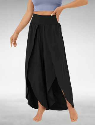 Black wide-leg pants with elastic waist and draped side slit hems