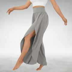 Gray wide-leg pants with elastic waist and flowing side slit drape