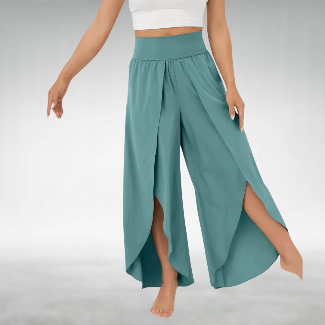 Turquoise wide-leg pants with elastic waist and draped side slit hem