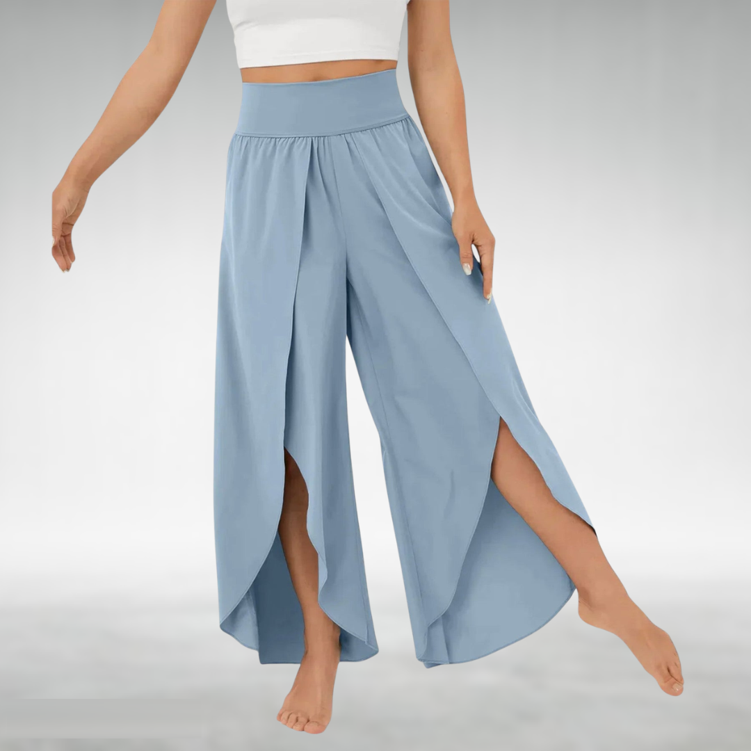Light blue wide-leg pants with elastic waist and flowing side slit legs